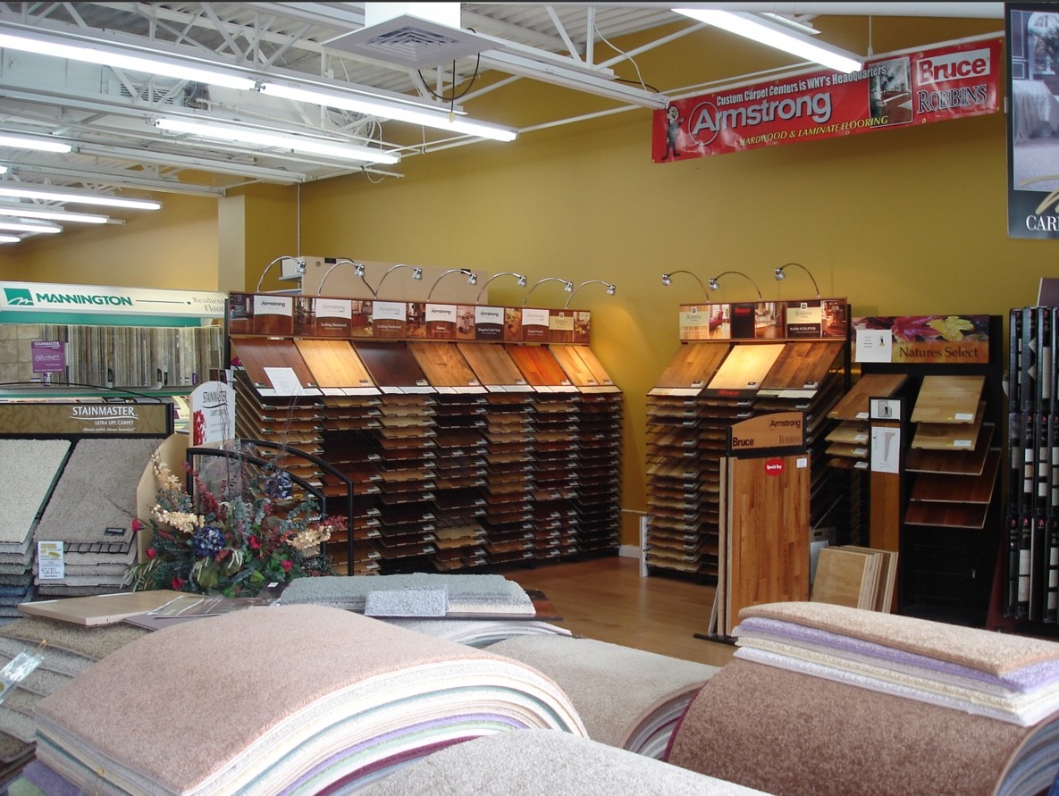 Variety of flooring products in showroom | Custom Carpet Centers